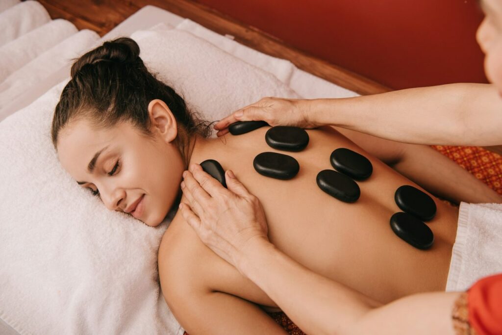 Hot stone massage treatment at a spa