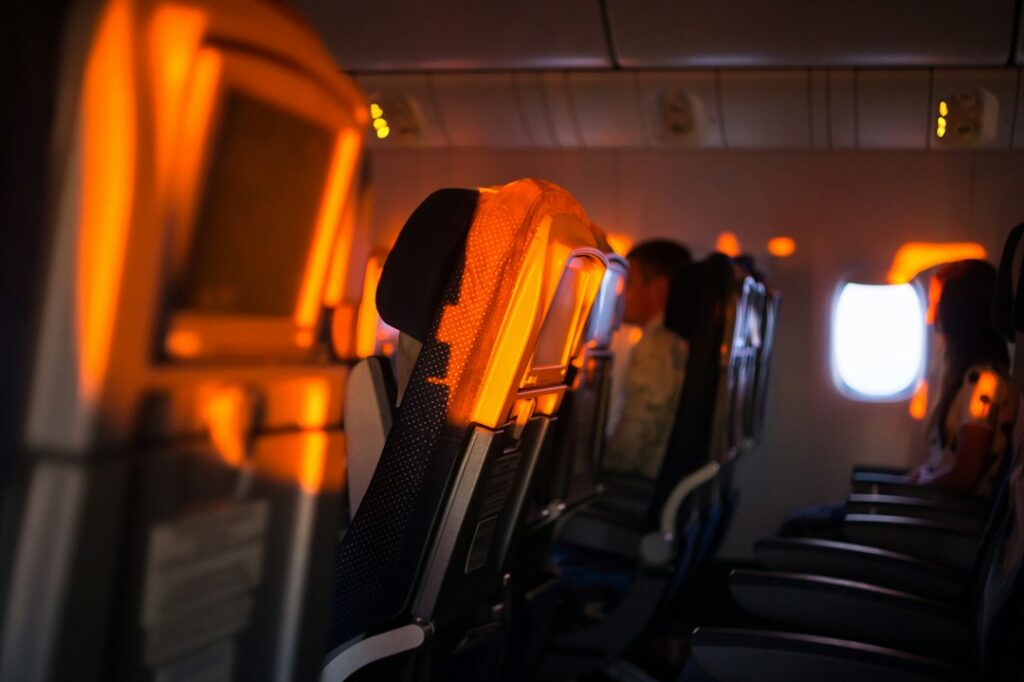 Airplane cabin representing long-haul travel wellness