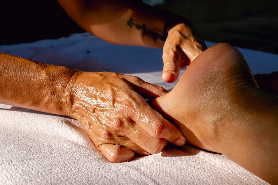 Therapist giving a foot massage