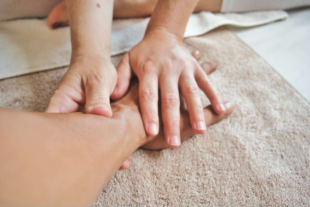 Hands receiving a massage