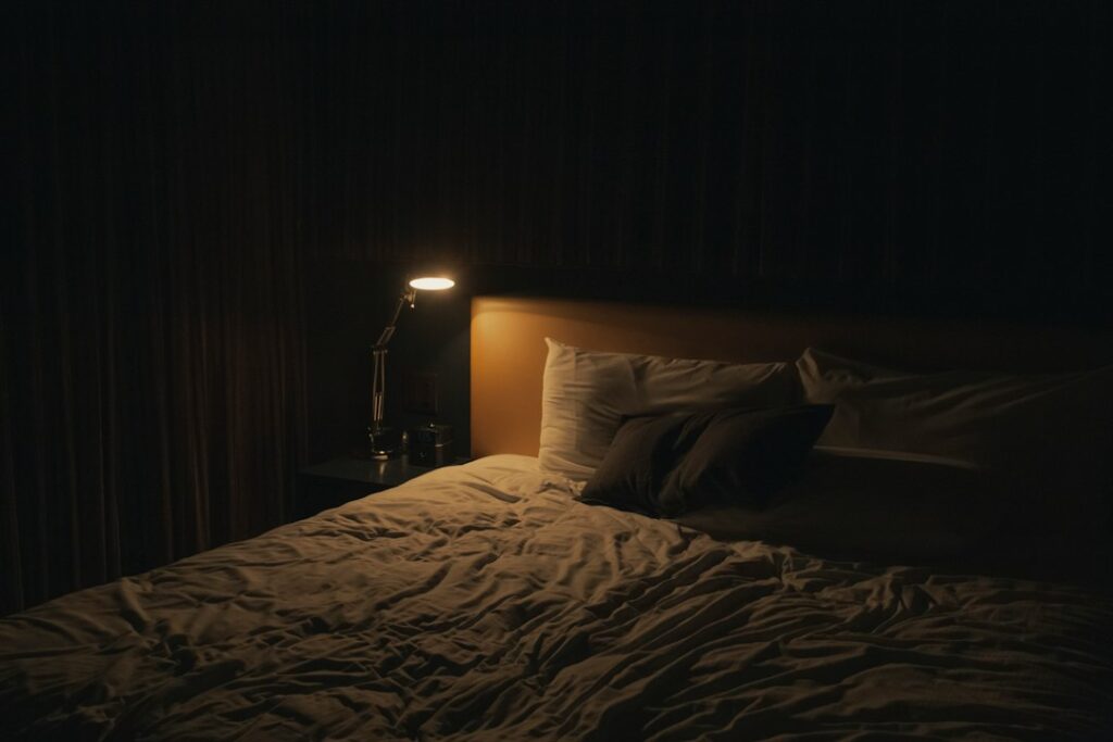 Calm bedroom representing healthy sleep and recovery