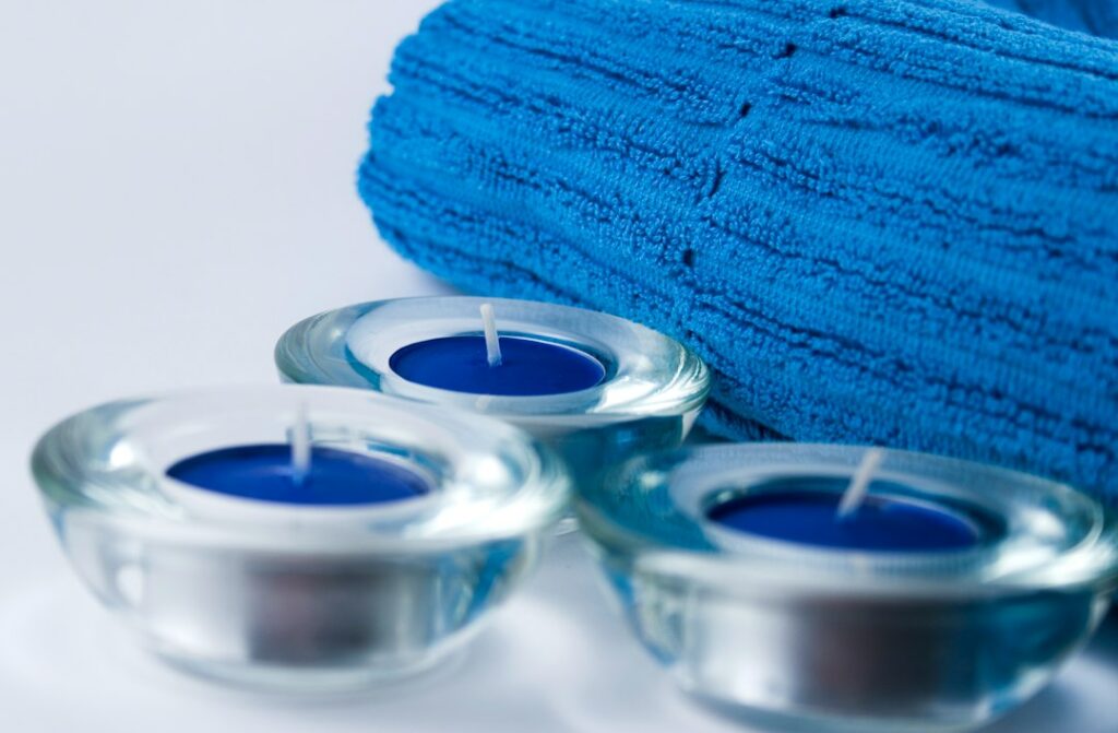 Spa towels and candles for relaxation and wellness