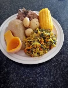 Balanced meal before a long flight with chicken, potatoes, vegetables and corn