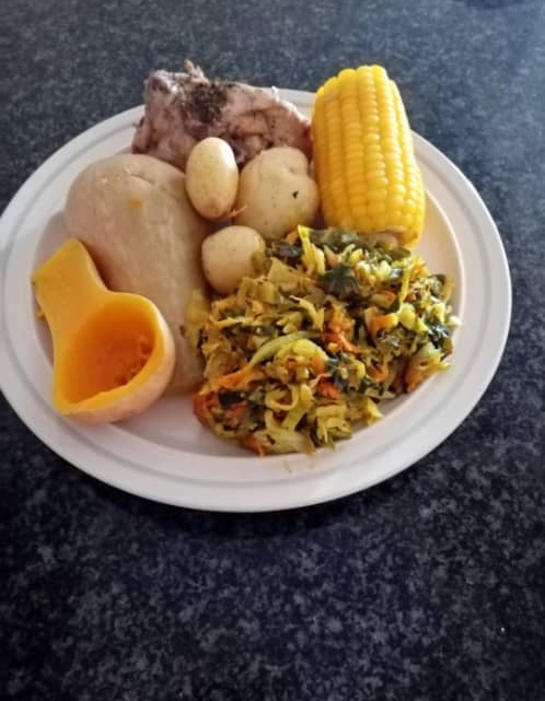 Balanced meal before a long flight with chicken, potatoes, vegetables and corn