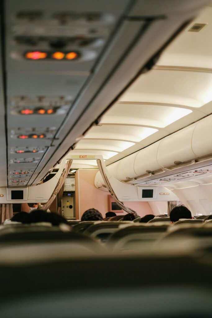 Passenger airplane cabin, illustrating long periods of sitting during flights